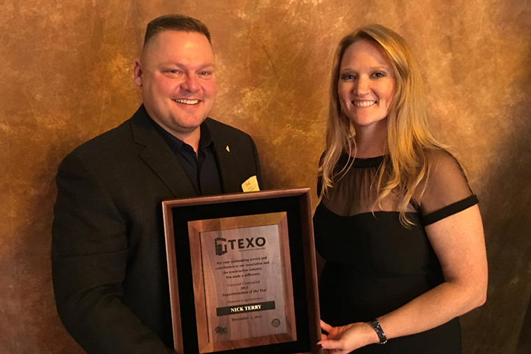 TEXO award plaque · formal portrait