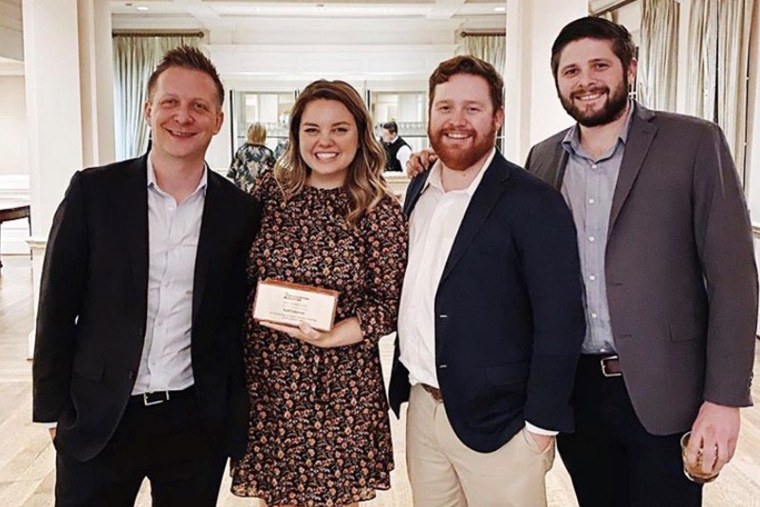 Indoor ceremony · award certificate handoff