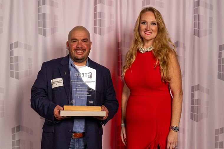 Awards ceremony · two-person portrait with wooden plaque